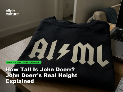 Code Culture blog banner for How Tall Is John Doerr? John Doerr's Real Height Explained, featuring a aiml 100416 developer t-shirt.