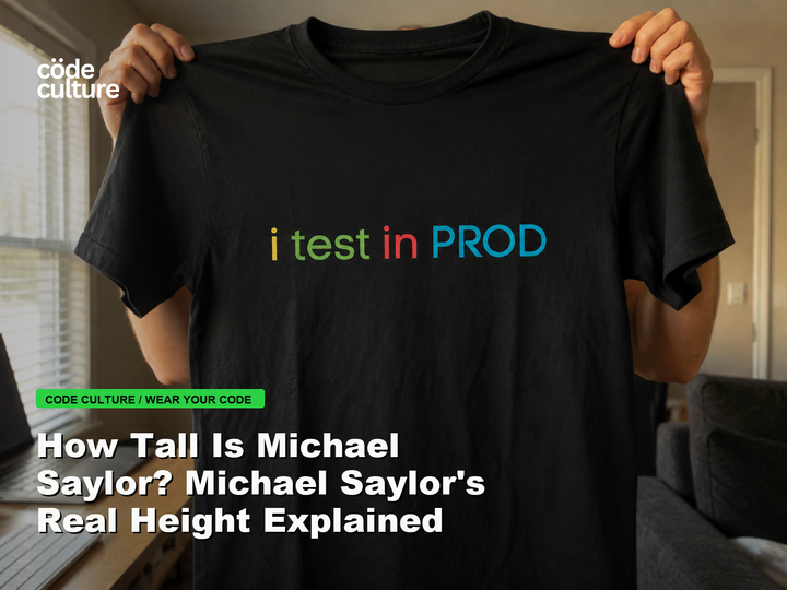 Code Culture blog banner for How Tall Is Michael Saylor? Michael Saylor's Real Height Explained, featuring a i test in prod developer t-shirt.