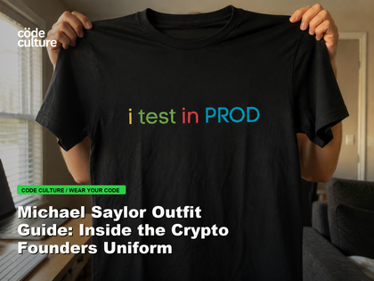 Code Culture blog banner for Michael Saylor Outfit Guide: Inside the Crypto Founders Uniform, featuring a i test in prod developer t-shirt.