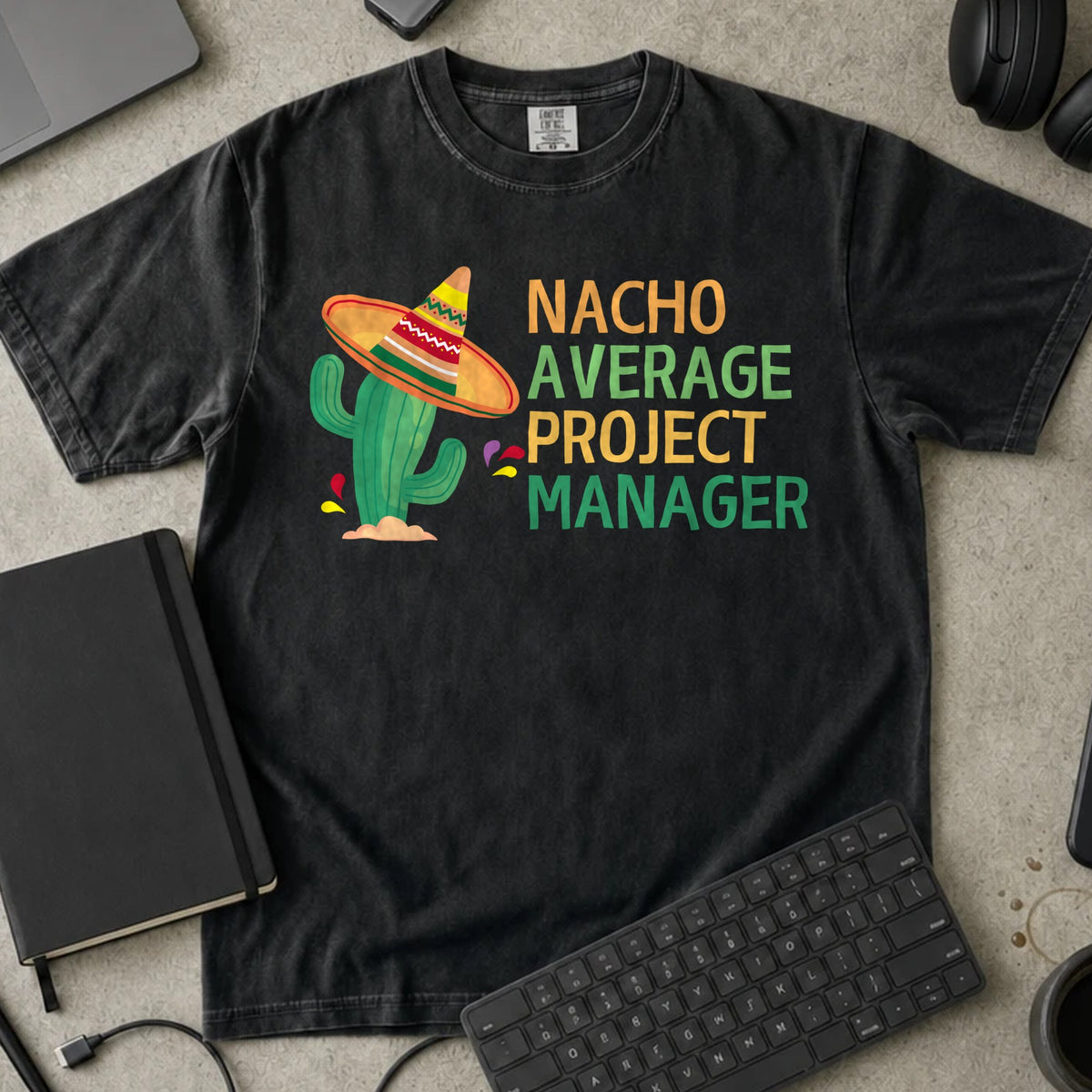 Nacho Average Project Manager Shirt in Black, Comfort Colors 1717 tee flat lay