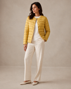 Women's Lightweight Down-Filled Quilted Jacket for Layering in Ginger Yellow, 02 standing lifestyle, worn by model