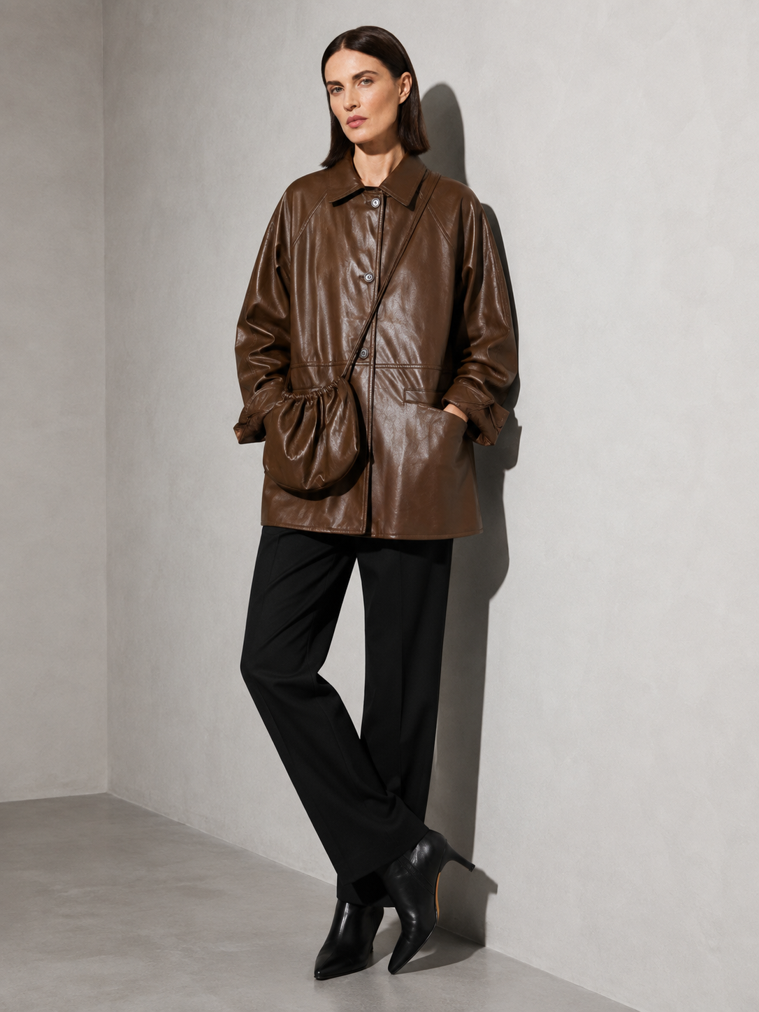 Women's Retro Motorcycle PU Leather Jacket with Bag in Red Brown With Bag, 03 seated or lean, worn by model