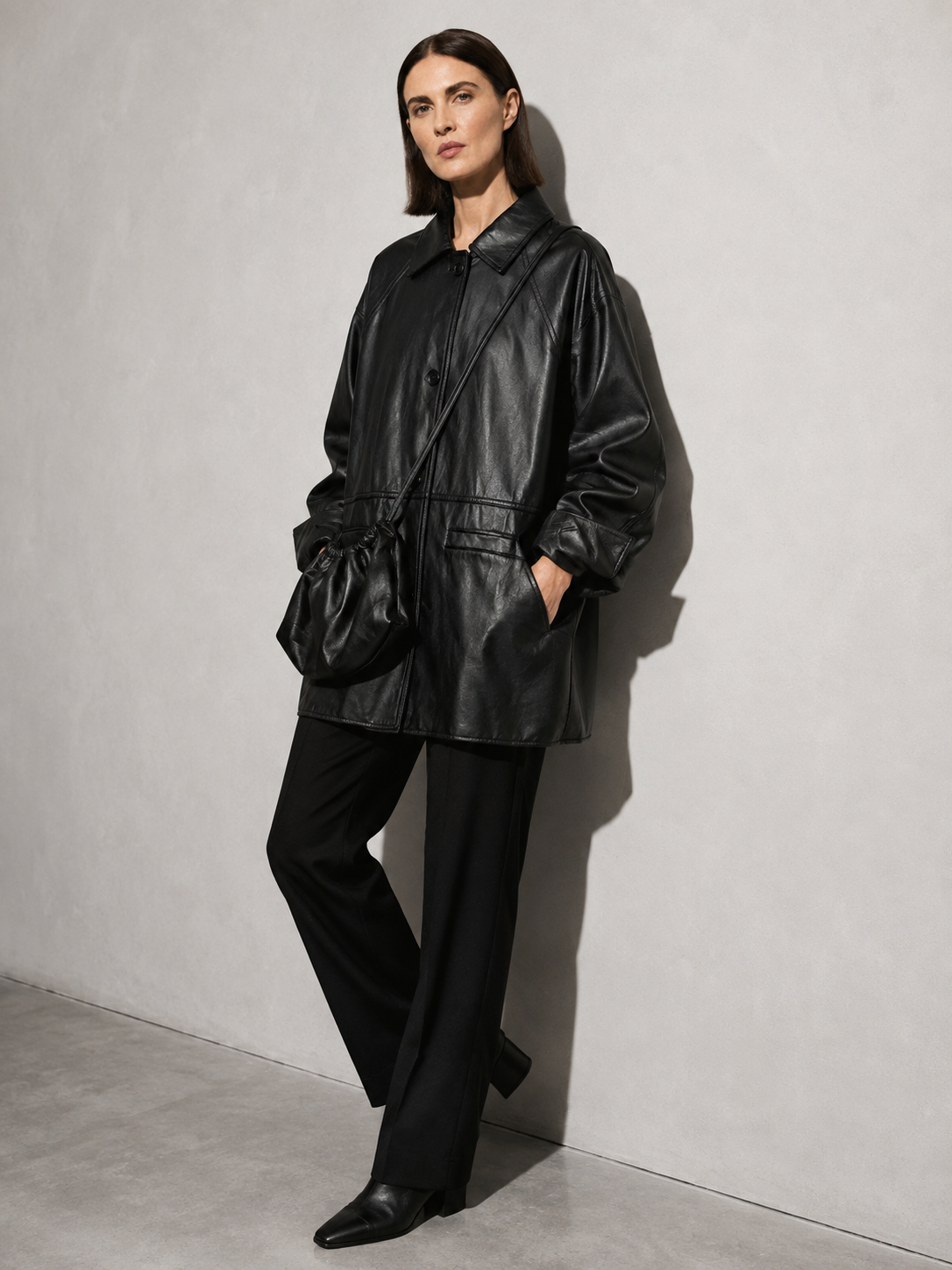 Women's Retro Motorcycle PU Leather Jacket with Bag in Black With Bag, 03 seated or lean, worn by model