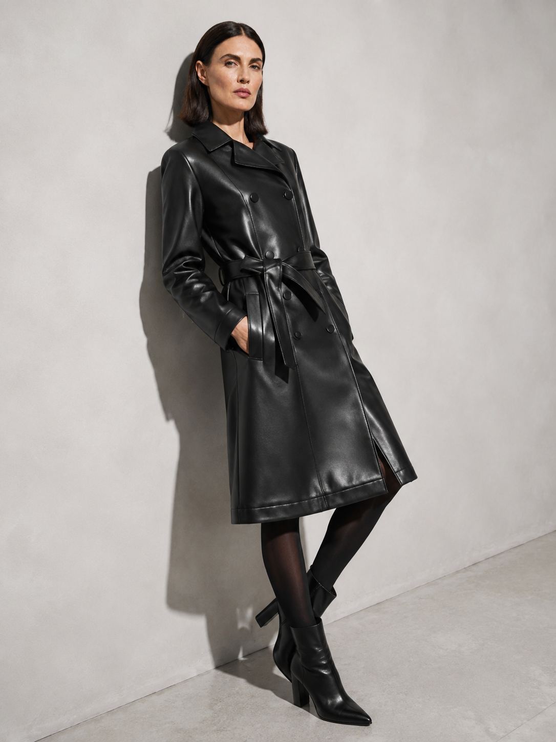 Women's PU Leather Mid-Length Windbreaker in Black, 03 seated or lean, worn by model