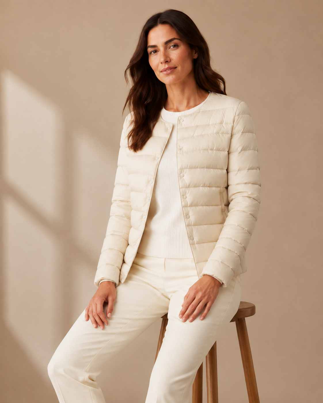 Women's Lightweight Down-Filled Quilted Jacket for Layering in Beige, 03 seated or leaning, worn by model