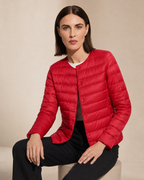 Women's Lightweight Down-Filled Quilted Jacket for Layering in Red, 03 seated or leaning, worn by model