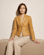 Women's Cropped Faux Leather Blazer with Lapel Collar in Yellow, 03 seated or leaning, worn by model