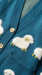 Code Culture catalog | lazy-knit-cardigan | blue | macro flat lay