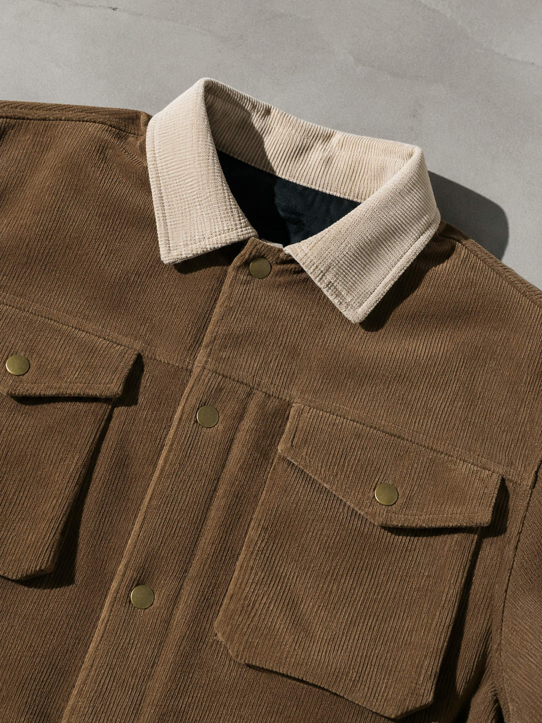 Code Culture catalog | asymmetric-color-contrast-patchwork-workwear-jacket | color-brown | macro flat lay