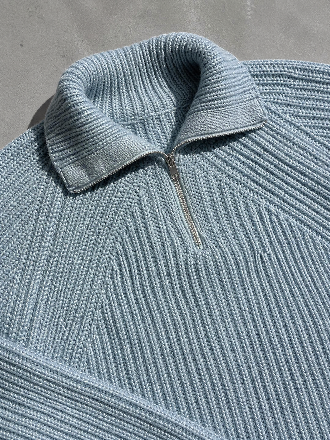 Code Culture catalog | mens-autumn-and-winter-turtleneck-half-zip-sweater | blue | macro flat lay