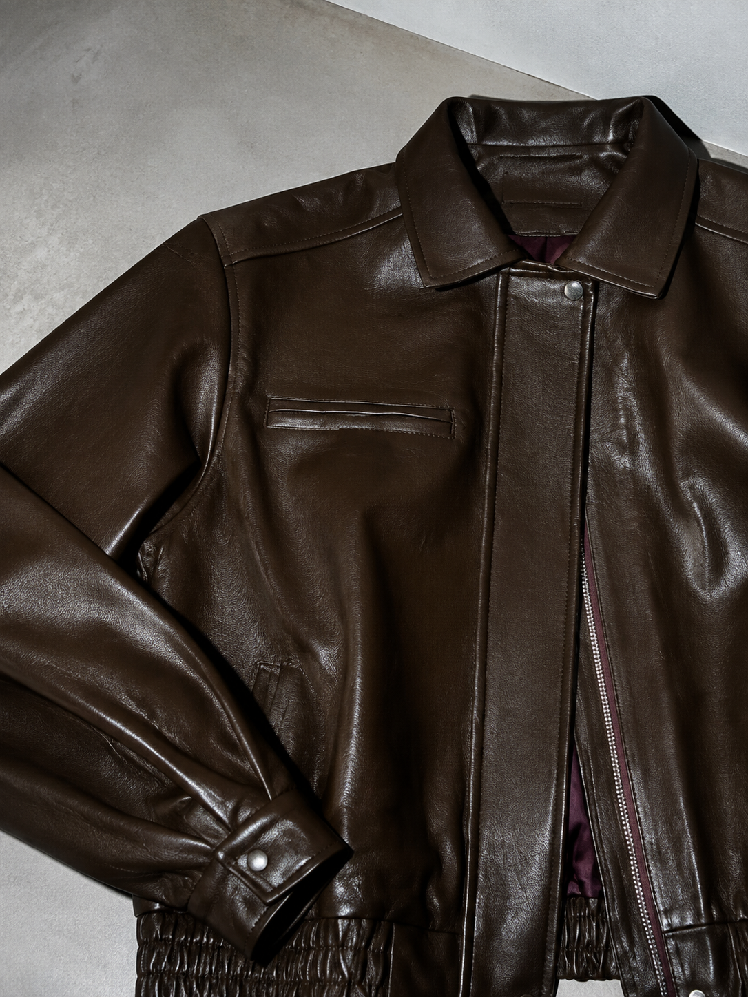 Code Culture catalog | brown-brown-autumn-trendy-leather-jacket | color-brown | macro flat lay