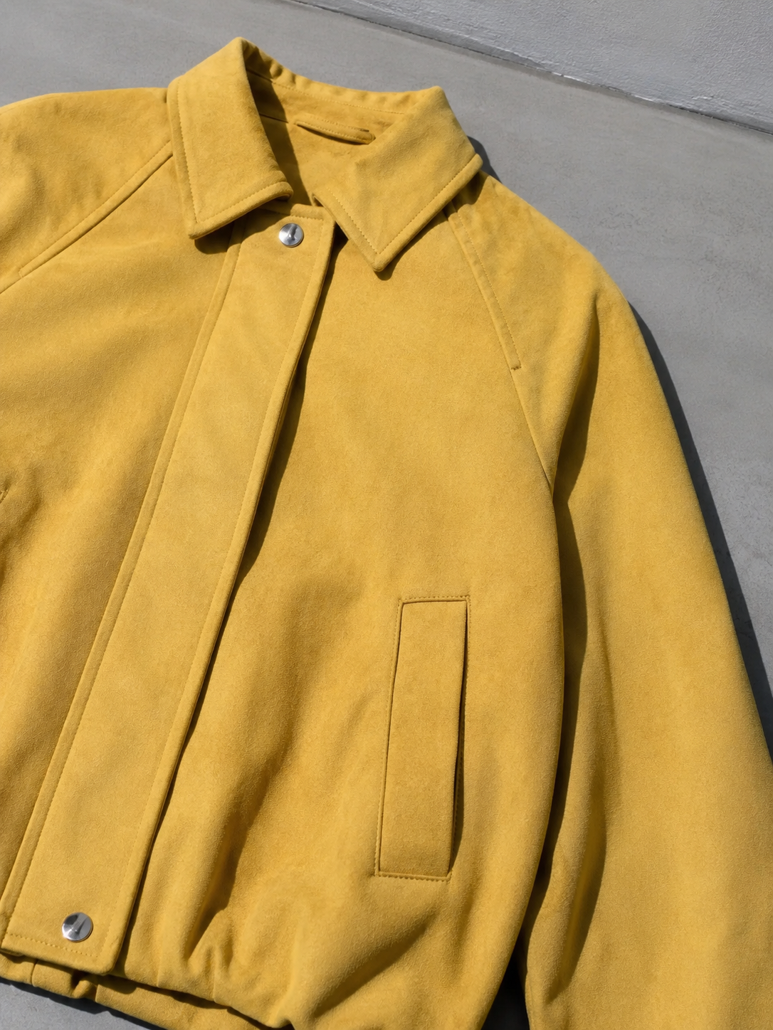 Code Culture catalog | womens-fashion-suede-bomber-jacket-coat | color-ginger-yellow | macro flat lay