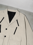 Code Culture catalog | loose-fitting-niche-design-workwear-jacket | color-apricot | macro flat lay