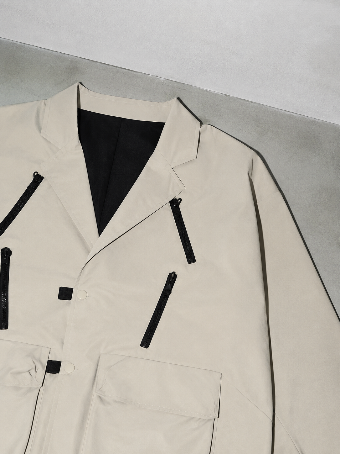 Code Culture catalog | loose-fitting-niche-design-workwear-jacket | color-apricot | macro flat lay