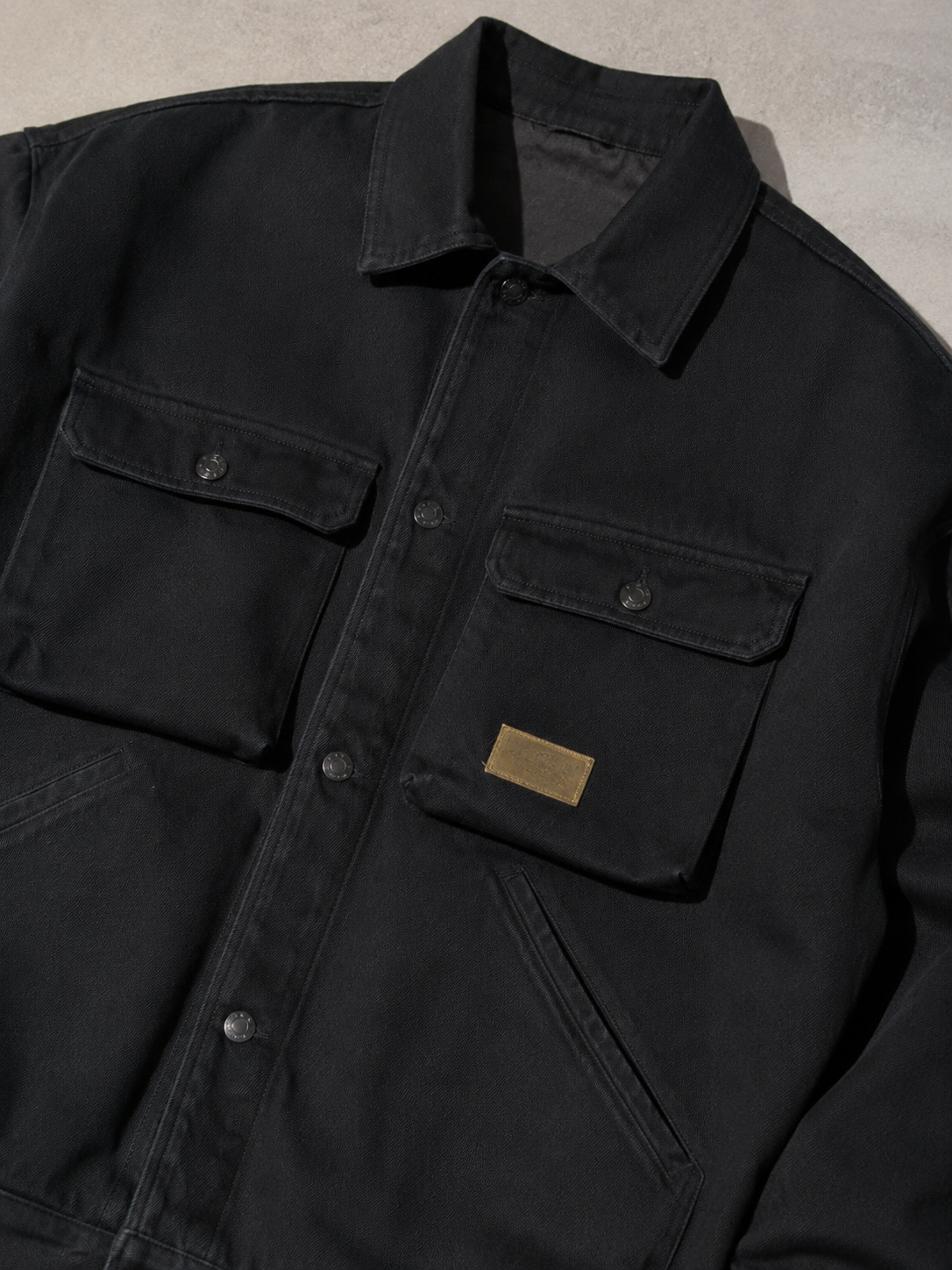 Code Culture catalog | motorcycle-loose-workwear-warm-jacket | color-black-plus-velvet | macro flat lay