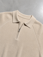 Code Culture catalog | american-casual-half-height-zip-polo-sweater | apricot-colored-rice | macro flat lay