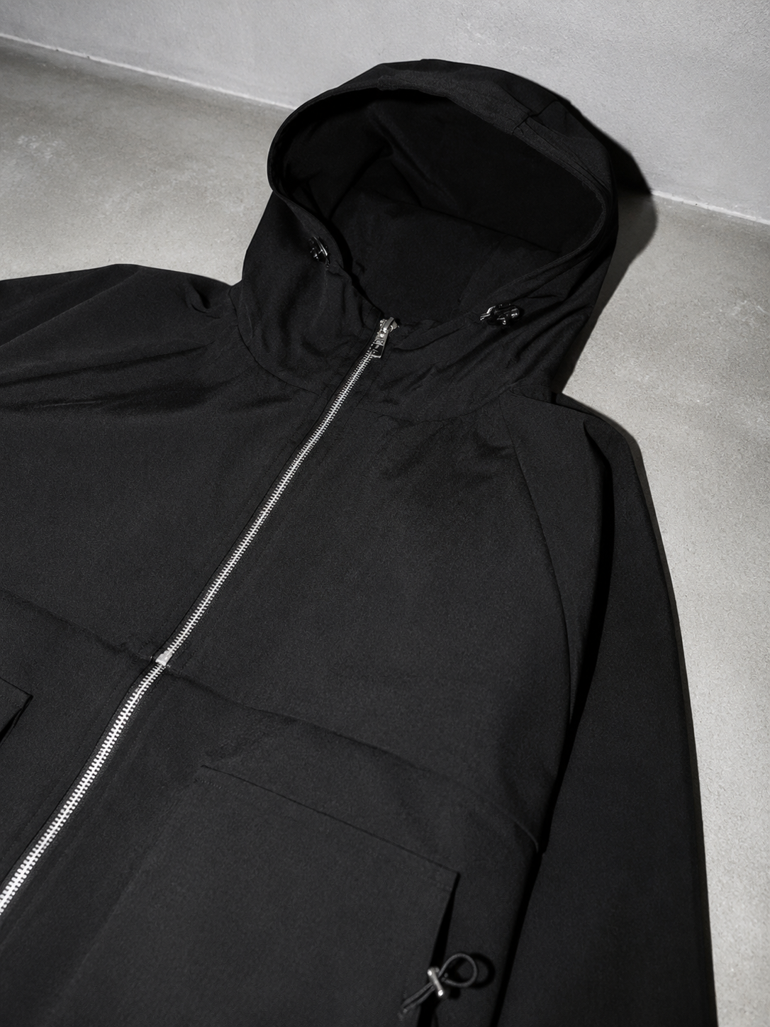 Code Culture catalog | mens-outdoor-fashion-casual-workwear-jacket | color-black | macro flat lay