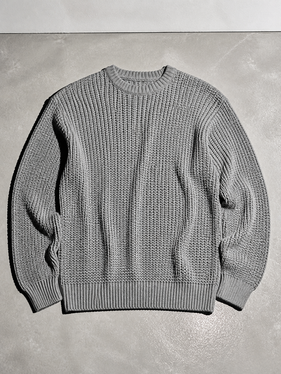 Code Culture catalog | mens-solid-color-long-sleeve-round-neck-fashion-sweater-loose-retro-sweater | gray | macro flat lay