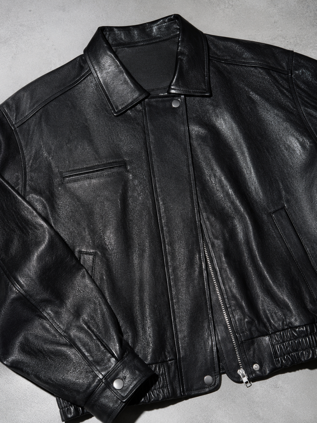 Code Culture catalog | brown-brown-autumn-trendy-leather-jacket | color-black | macro flat lay