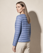 Women's Lightweight Down-Filled Quilted Jacket for Layering in Haze Blue, 04 back or side, worn by model