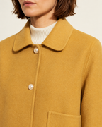 Women's Cropped Button-Front Woolen Jacket for Layering in Ginger Yellow, 05 material macro, worn by model