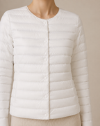 Women's Lightweight Down-Filled Quilted Jacket for Layering in White, 05 material macro, worn by model