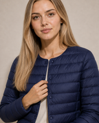 Women's Lightweight Down-Filled Quilted Jacket for Layering in Navy Blue, 05 material macro, worn by model