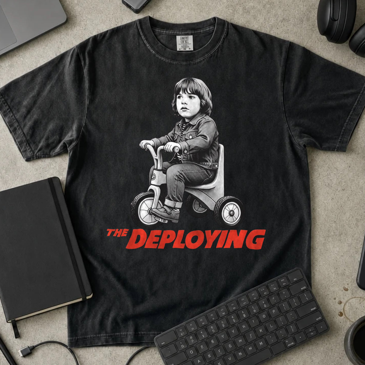 The Deploying Shirt in Black, Comfort Colors 1717 tee flat lay