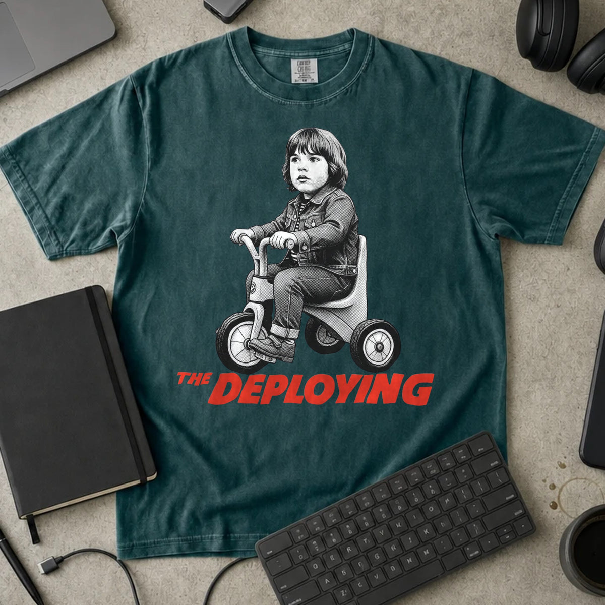 The Deploying Shirt in Blue Spruce, Comfort Colors 1717 tee flat lay