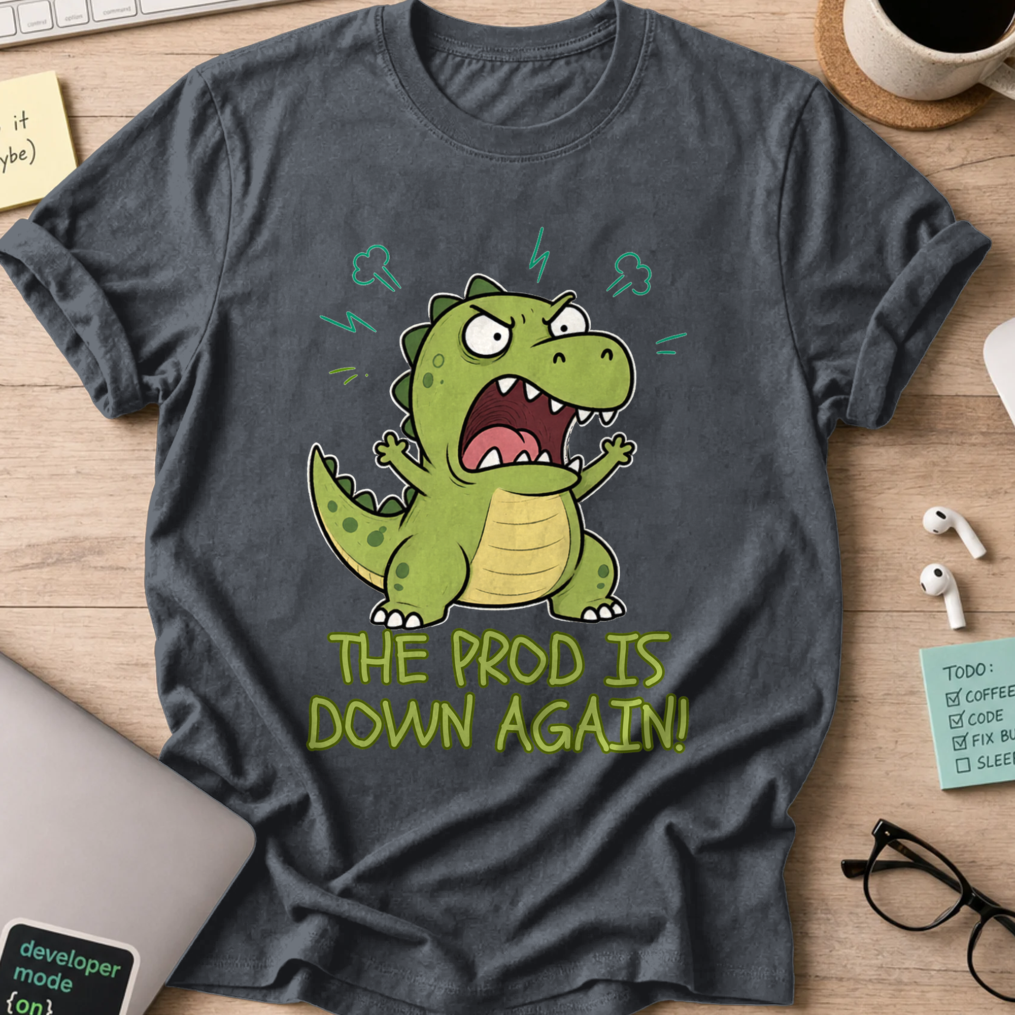 The Prod Is Down Again Cartoon Dinosaur Shirt — Dark Heather storefront mockup