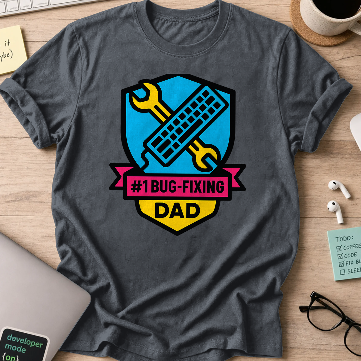 Dark Heather Grey programmer shirt printed with "#1 bug fixing dad", a funny developer t-shirt and gift for the programmer dad in your life.
