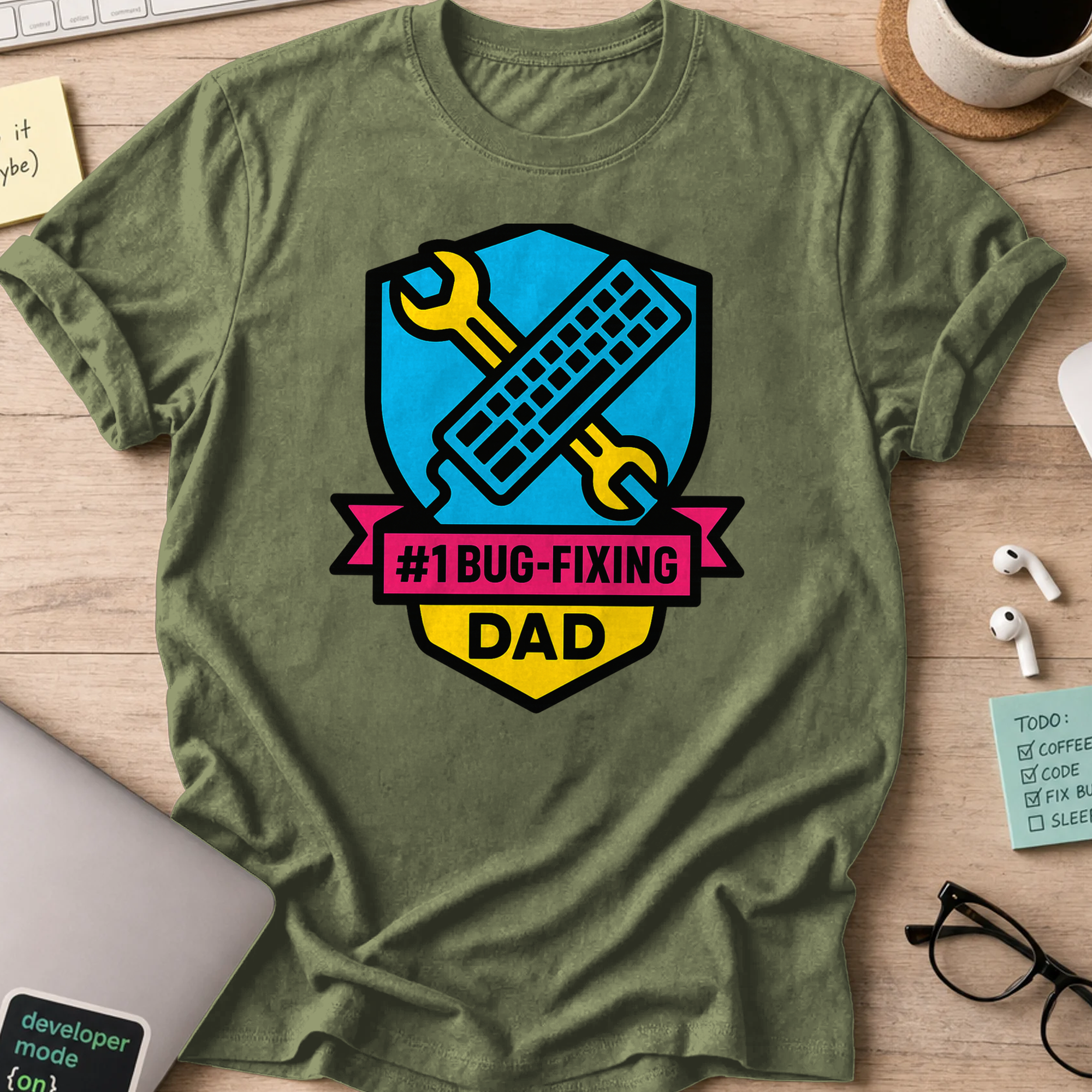 Military Green programmer shirt printed with "#1 bug fixing dad", a funny developer t-shirt and gift for the programmer dad in your life.