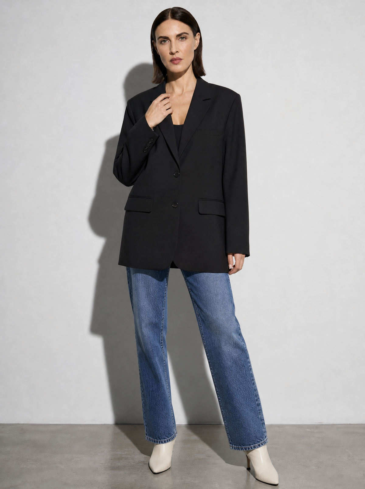 Women's Solid Color Loose Casual Single-breasted Coat in Black - adjusting view