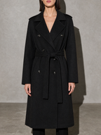 Double-breasted Belted Mid-length Wool Coat in Black - bust to thigh view
