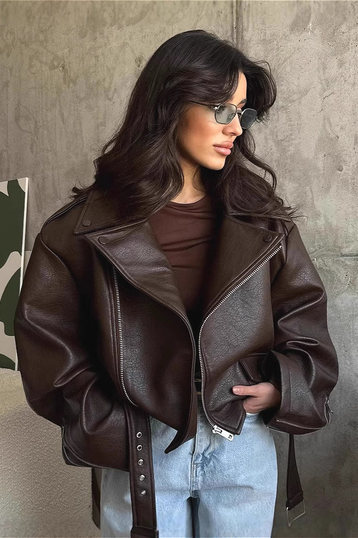 Women's dark brown faux leather moto jacket with belted tie, zip front, angled pockets