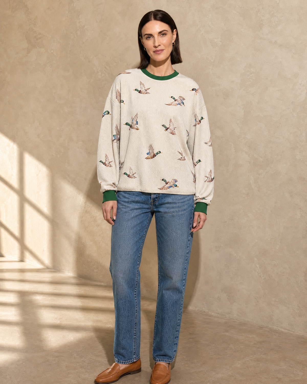 Womens Relaxed-fit Pullover Sweatshirt With An Animal Print in Beige, frontal relaxed stand, worn by model