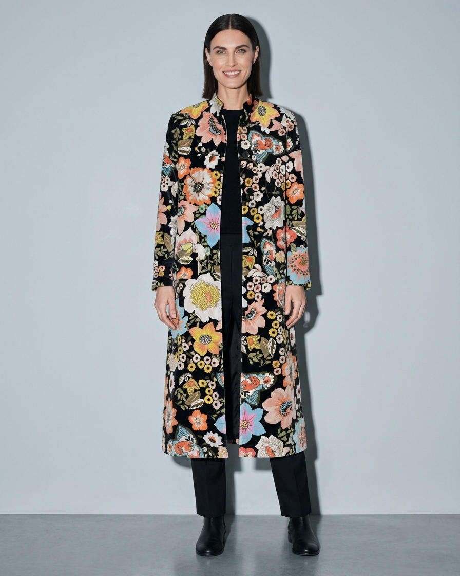 Women's Black Printed Velvet Long Coat, frontal relaxed stand, worn by model