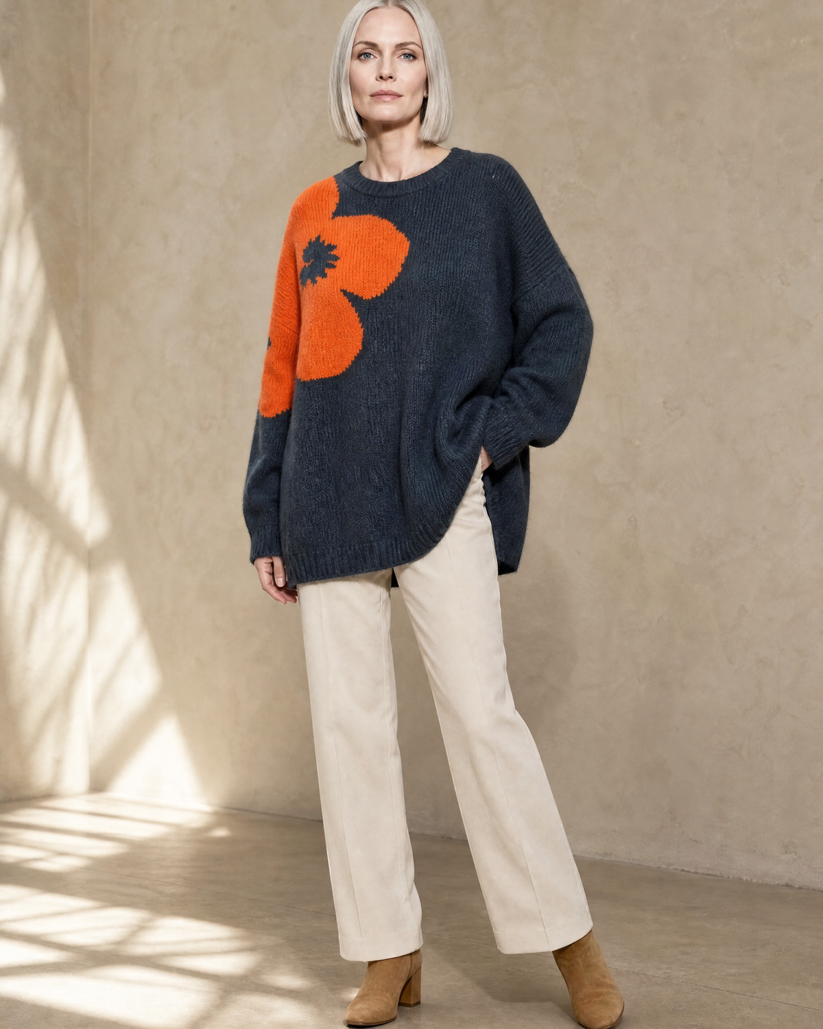 Women's Fashionable Pullover Sweater Top in Charcoal, contrapposto hand on hip, worn by model