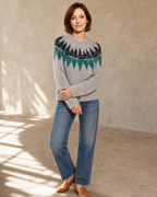 Women's Fashionable Pullover Sweater Top in Teal, loose arm cross, worn by model