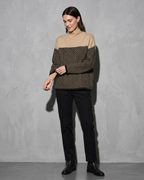 Women's Ribbed Turtleneck Knit Sweater, adjusting the sleeve, worn by model