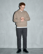 Men's Ribbed-Hem Lapel Knit Sweater, adjusting the sleeve, worn by model