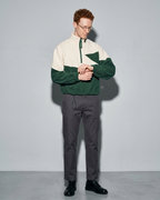 Men's Cropped Stand-Collar Zip Sweater, adjusting the sleeve, worn by model