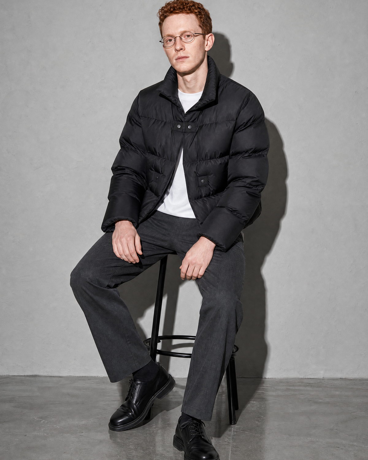 Coffee Color Cotton-padded Clothes Short Cotton Coat, stool, forearms on thighs, worn by model