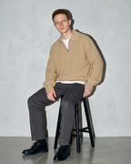 Men's Light Business Lapel Knit Sweater, stool, forearms on thighs, worn by model