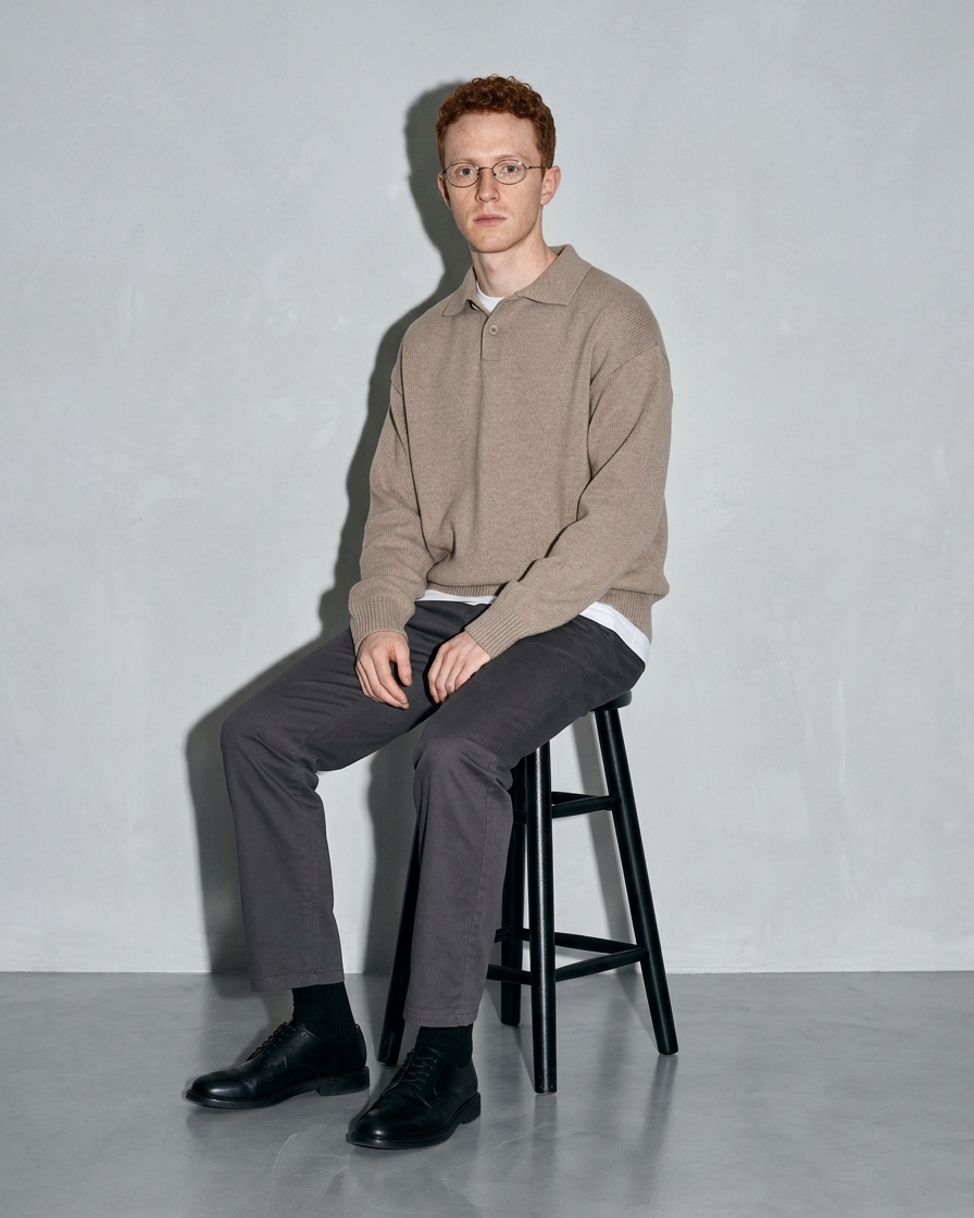 Men's Ribbed-Hem Lapel Knit Sweater, stool, forearms on thighs, worn by model