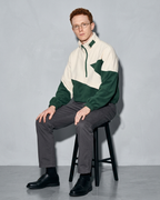 Men's Cropped Stand-Collar Zip Sweater, stool, forearms on thighs, worn by model
