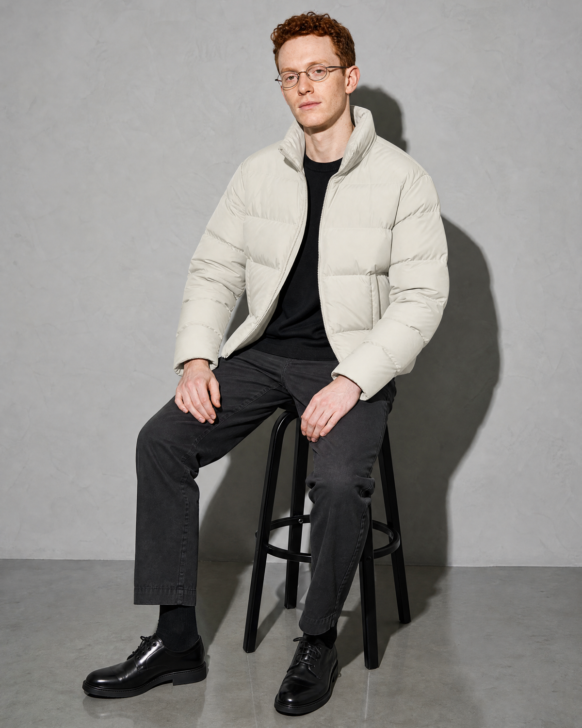 Solid Color Jacket For Men And Women, stool, forearms on thighs, worn by model