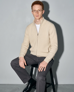 Men's Retro Zip-Front Knit Cardigan, stool, forearms on thighs, worn by model