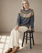 Women's Fashionable Pullover Sweater Top in Sea Blue, stool, side saddle profile, worn by model