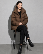 Women's Fashion Loose Thickening Keep Warm Coat, stool, legs crossed, worn by model